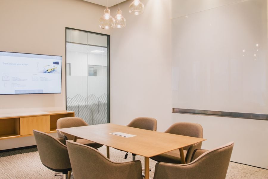 2. The workspace in Spaces - World Plaza features stylish furniture