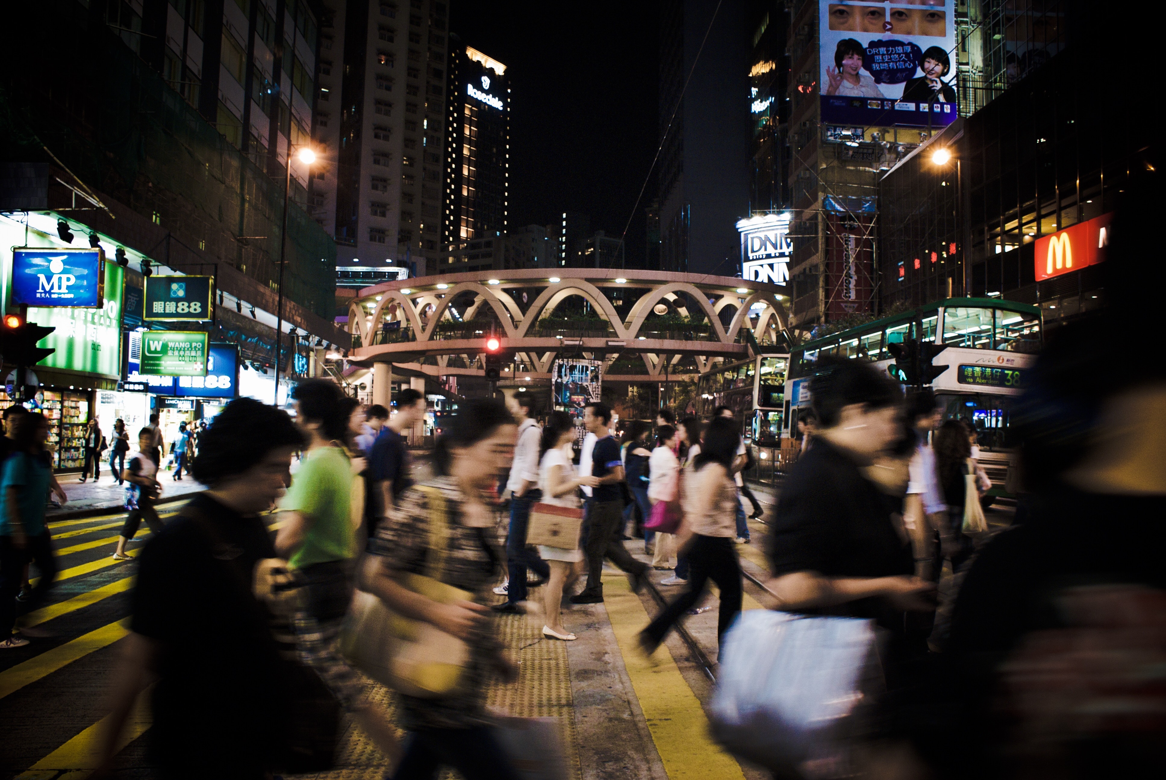 crowd of people crossing street