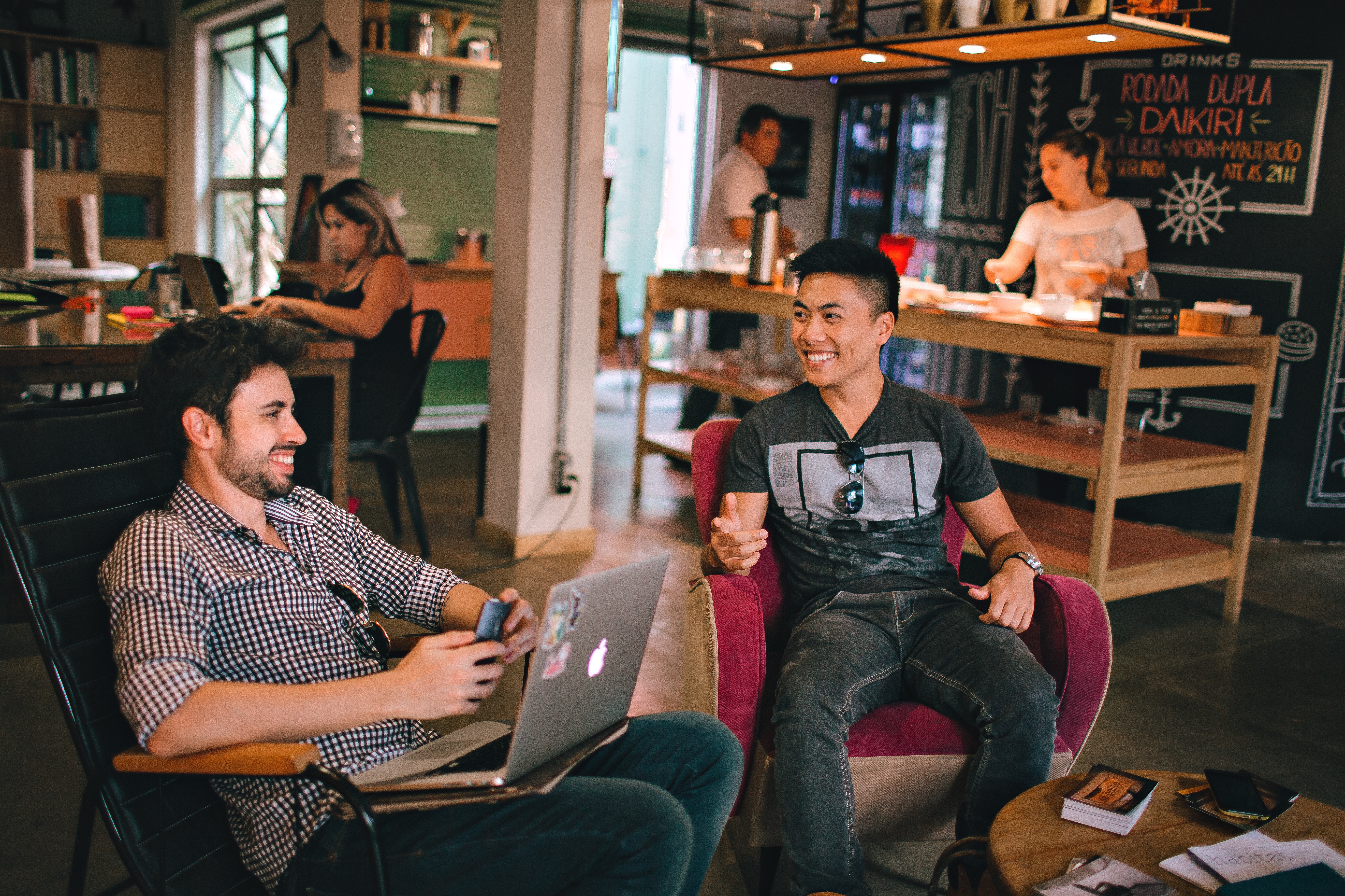 people having conversation coworking space